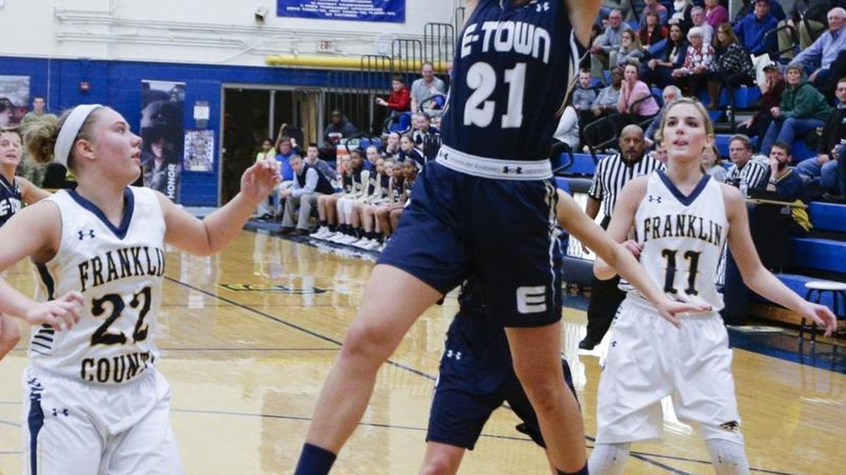 Elizabethtown's Erin Boley pulled down a rebound as #4 Franklin County defeated #1 Elizabethtown 56-52 on Friday February 12, 2016 in Frankfort, Ky.