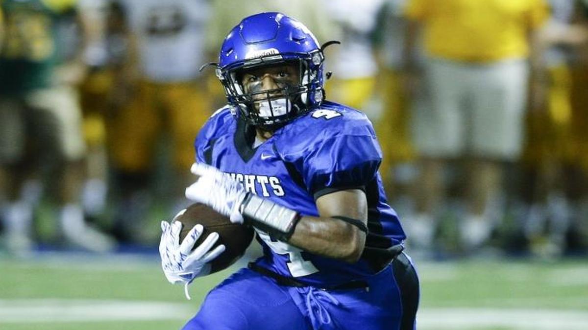 Lexington Catholic’s Dameon Jones, shown in the Knights’ game against St. Xavier earlier this season, rushed for 170 yards in a 21-20 road loss to Covington Catholic on Friday.