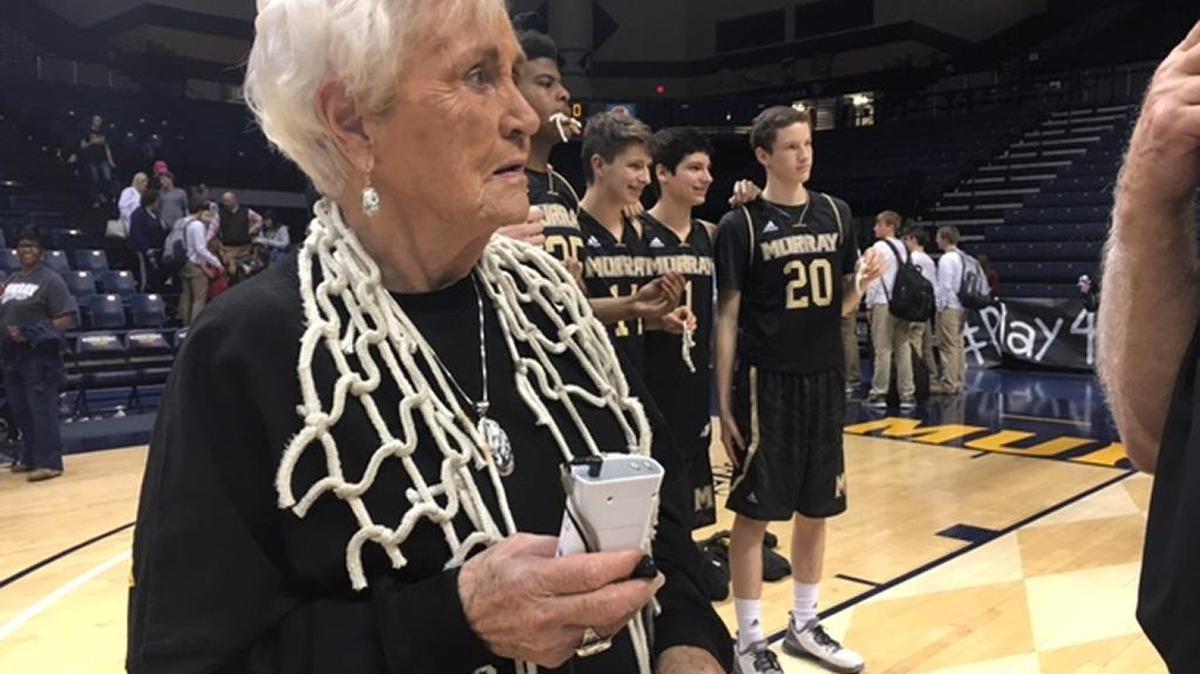 Jean Flener joined the celebration on the court after Murray won the 1st Region championship last week.