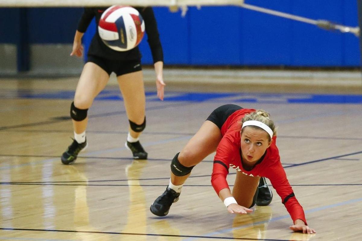 Paul Laurence Dunbar's Allie Chapman (5) digs the ball during a game against Henry Clay at Henry Clay High School in Lexington, Ky., Wednesday, Sept. 6, 2017.