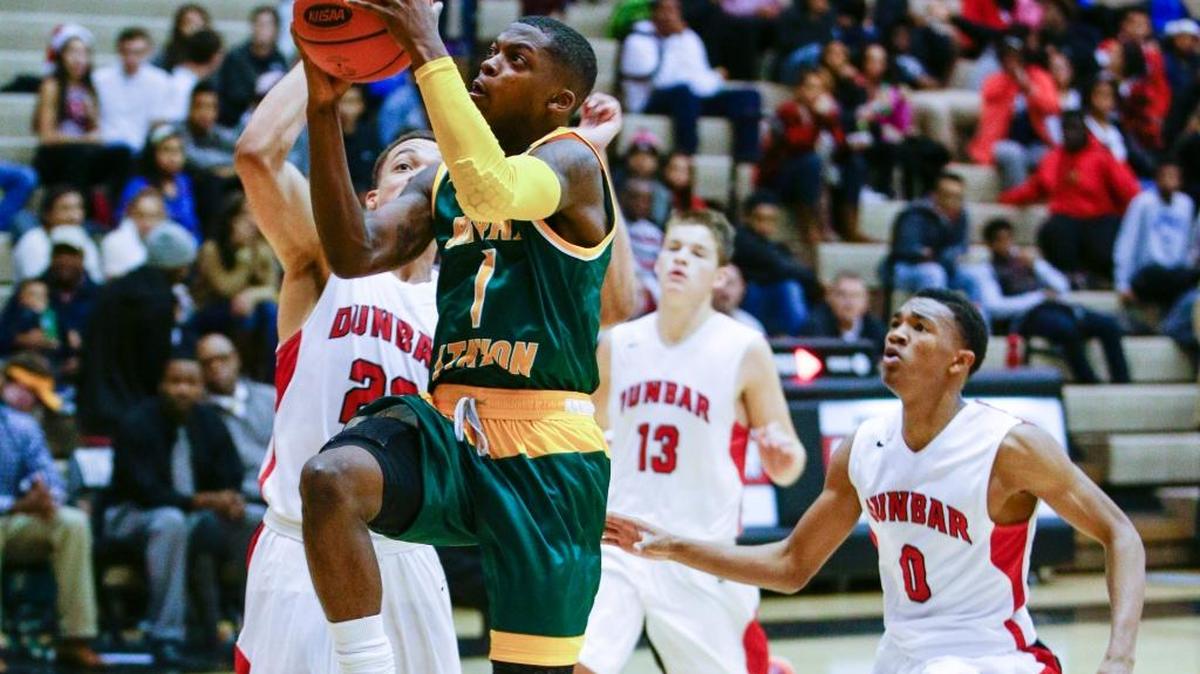 Bryan Station's Andre Davis drove the lane for a basket as Dunbar played Bryan Station on Thursday December 3, 2015 in Lexington, Ky.