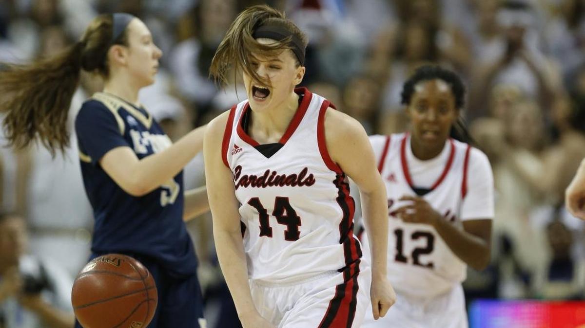 Clark County’s Kennedy Igo (14) reacted after blocking a shot against Elizabethtown last season. Igo, voted by coaches as one of the state’s top 10 players, helps lead a Cardinals squad ranked No. 2 in the preseason.