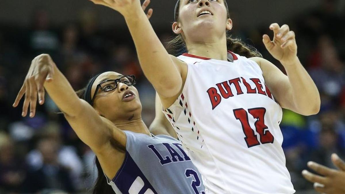 Butler's Micaiah Bowden puts up a reverse lay up in front of Bowling Green's Ta Mia Matthews during Butler's 64-52 win in the first round of the 2016 St. Elizabeth Healthcare/KHSAA Girls' Sweet 16 State Tournament, Thursday, March 10, 2016.