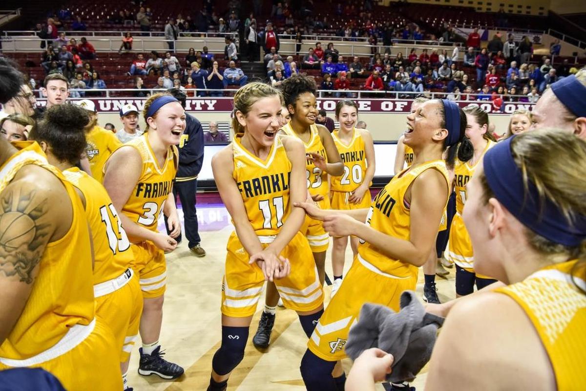 Franklin County's Rebecca Cook (11), center, celebrates with her teammates after beating Lafayette 54-37, during the girls 11th Region Tournament finals, Saturday, March 4, 2017, at EKU's McBrayer Arena in Richmond.during the girls 11th Region Tournament finals, Saturday, March 4, 2017, at EKU's McBrayer Arena in Richmond.