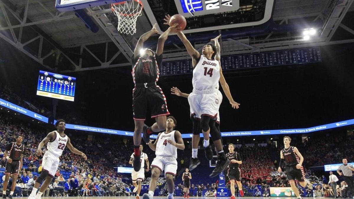 Ballard's Antoine Darby (14) blocked Taylor County's DeJohn Irvin (2) in the first quarter of the Ballard vs. Taylor Co. first round game of the Boy's Sweet Sixteen basketball tournament at Rupp Arena in Lexington, Ky, on March 16, 2017. FIRST HALF