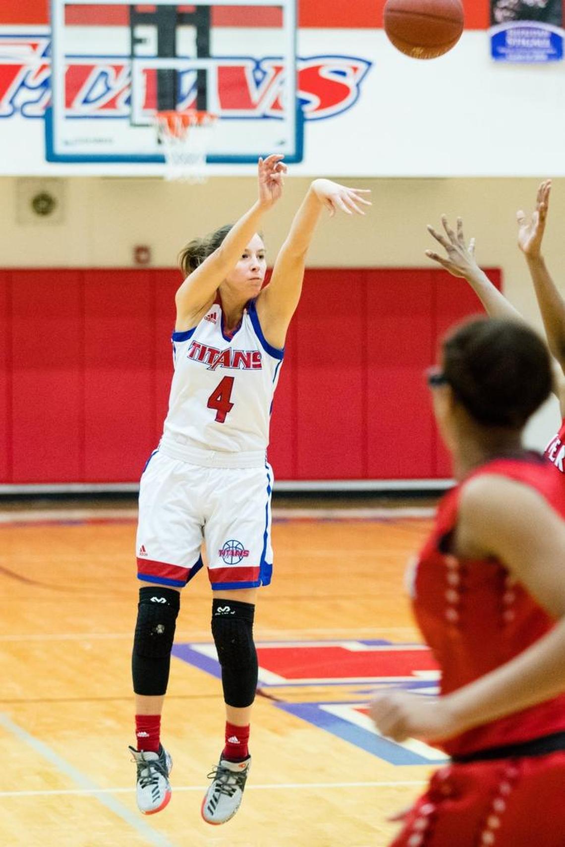 Mercer County's Seygan Robins (4) shot as host Mercer defeated Butler 68-45.