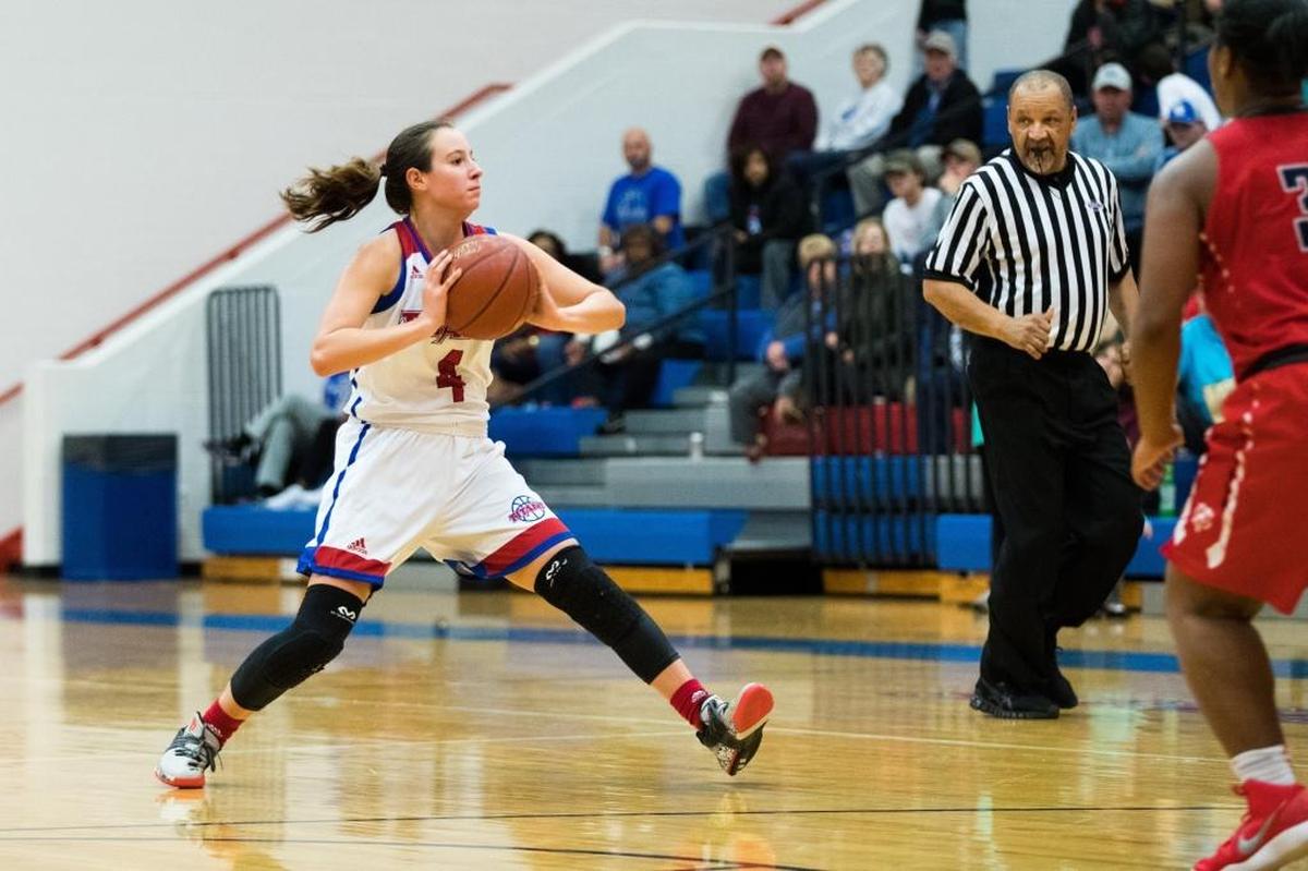 Mercer County's Seygan Robins (4) passed the ball as host Mercer defeated Butler 68-45.
