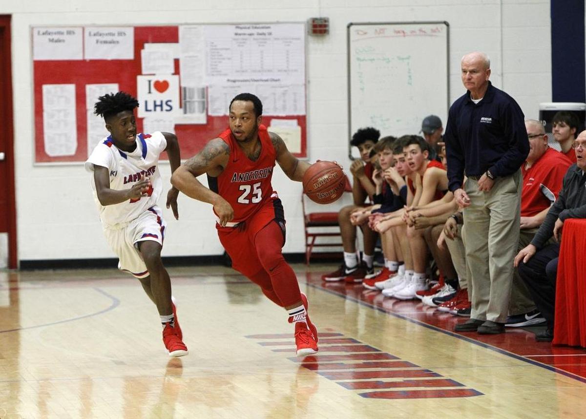 Anderson County head coach Glen Drury watches as Cobe Penny moved the ball against Lafayette's Alassane Diallo, left, Saturday during the Jock Sutherland Classic at Lafayette High School.