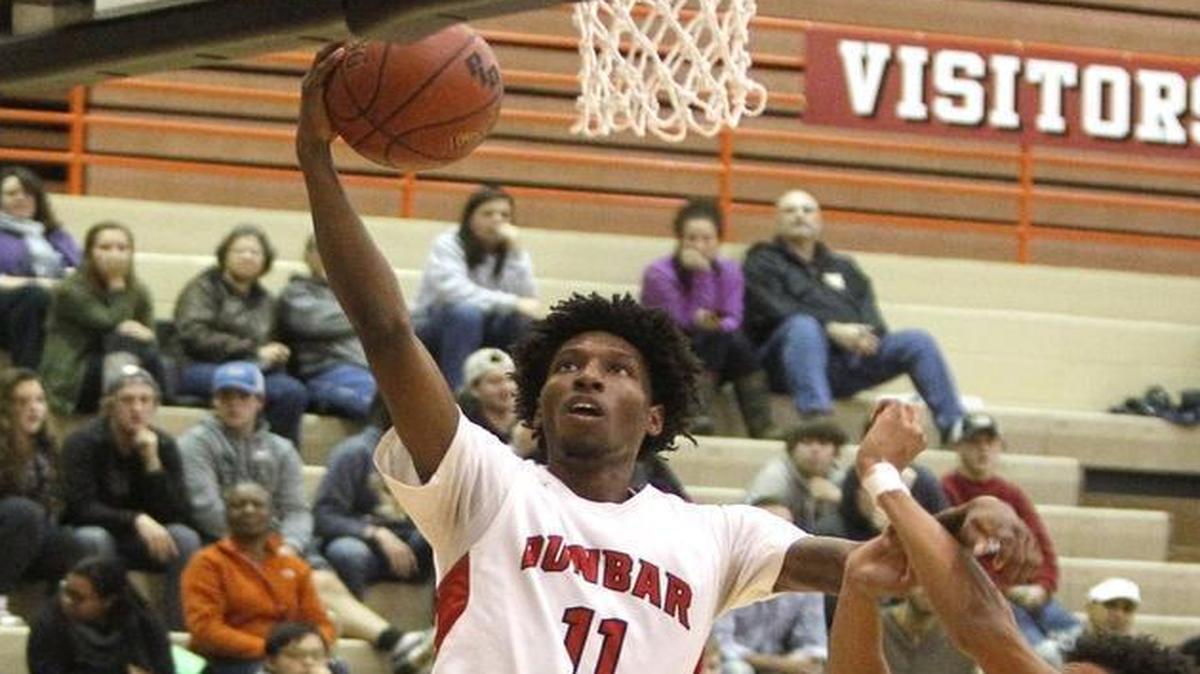 Paul Laurence Dunbar’s Taveion Hollingsworth shot against Woodford County in November. On Thursday, Hollingsworth set a career scoring record at the school in the Bulldogs’ 74-69 win over Bryan Station. Hollingsworth is on pace to break the all-time city scoring record.