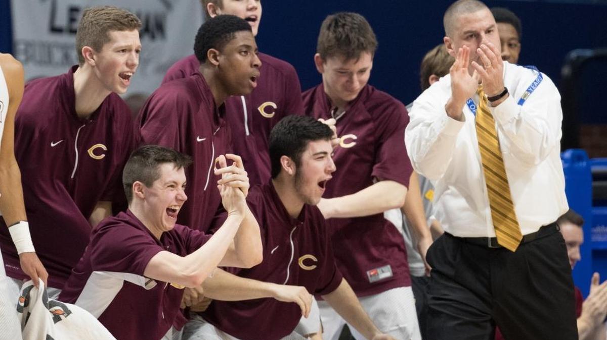 Cooper’s bench cheered during the Jaguars’ victory over Fern Creek in Saturday night’s Sweet Sixteen semifinals.