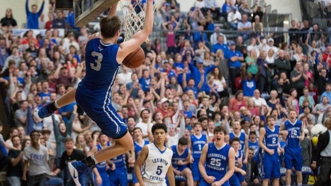 Lexington Christian Carter Hendrickson (3) dunked the ball in the final minute as Lexington Catholic hosted Lexington Christian in the 43rd district basketball finals on Friday Feb. 24, 2017 in Lexington, Ky.