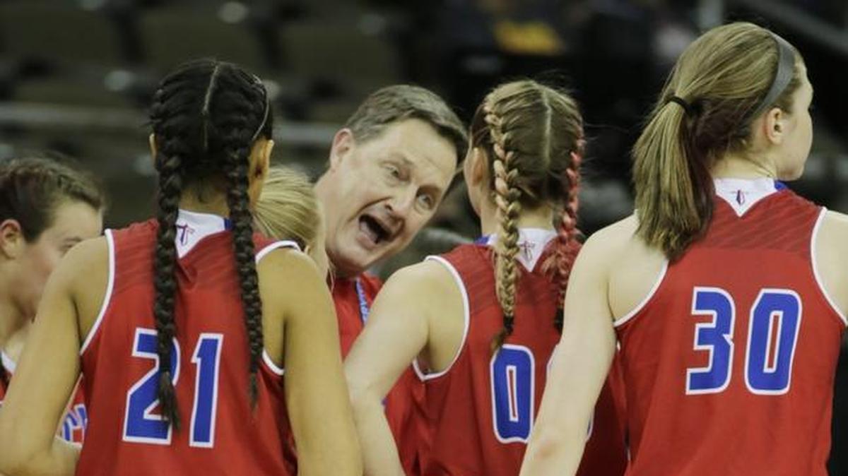 Mercer County Coach Chris Souder instructed his team during its first-round Sweet Sixteen game against Boyd County on March 8, 2017. The Titans went on to win the state title.