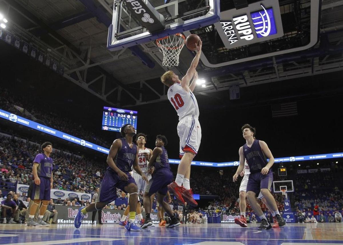 Scott County's Cooper Robb shoots against Bowling Green during the quarterfinals of the Whitaker Bank/KHSAA Boys' Sweet 16 at Rupp Arena in Lexington, Ky., Friday, March 17, 2017.