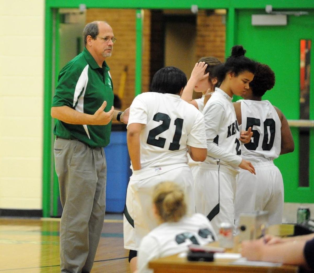 Kentucky School for the Deaf girls’ basketball coach Billy Lange, left, has coached just about every program the school has offered since he arrived there in the late 1980s. Lange, who also was the school’s athletics director, retired on Friday, Dec. 1, 2017.