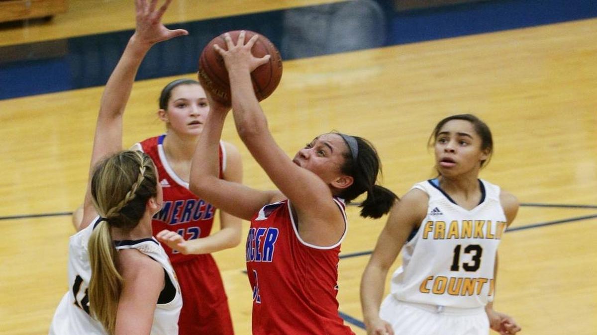 Mercer County's Lyric Houston scored in the lane as Mercer Defeated Franklin County 72-63 on Thursday January 12, 2017 in Frankfort, Ky.