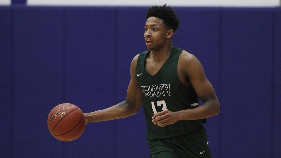 Trinity's David Johnson runs the point against Madison Central at Madison Central gymnasium in Richmond, Ky., Friday, January 26, 2018.