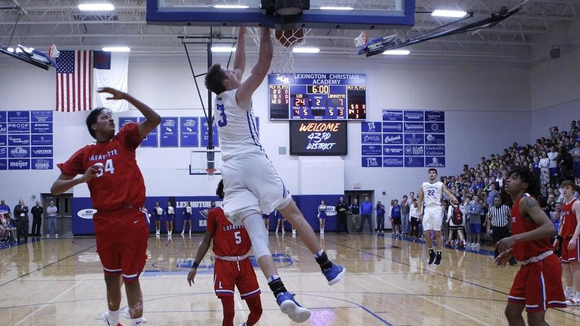 Lexington Christian's Carter Hendrickson dunked against Lafayette during the boys' 43rd district championship at Lexington Christian.