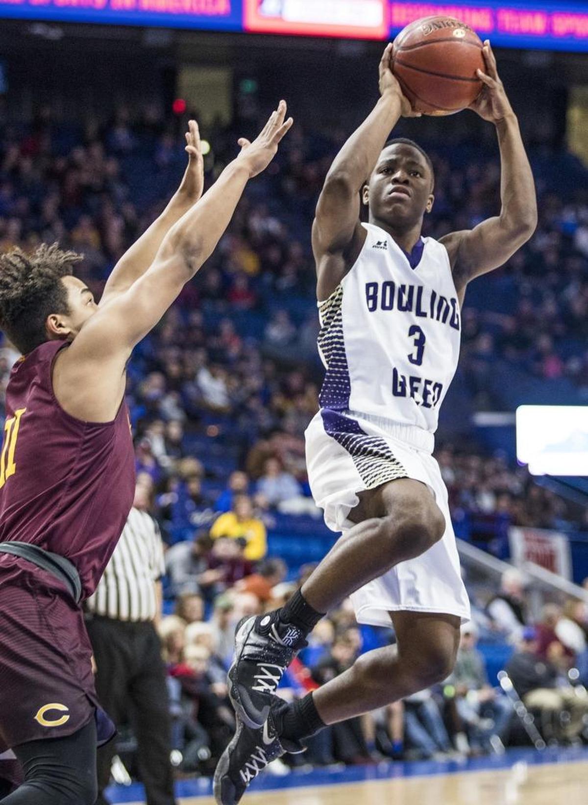 Bowling Green's Zion Harmon (3) shoots against Cooper during the team's 67-56 win in the KHSAA Boysâ€™ Sweet 16 high school basketball championship, on Sunday, March 19, 2017, in Lexington, Ky.