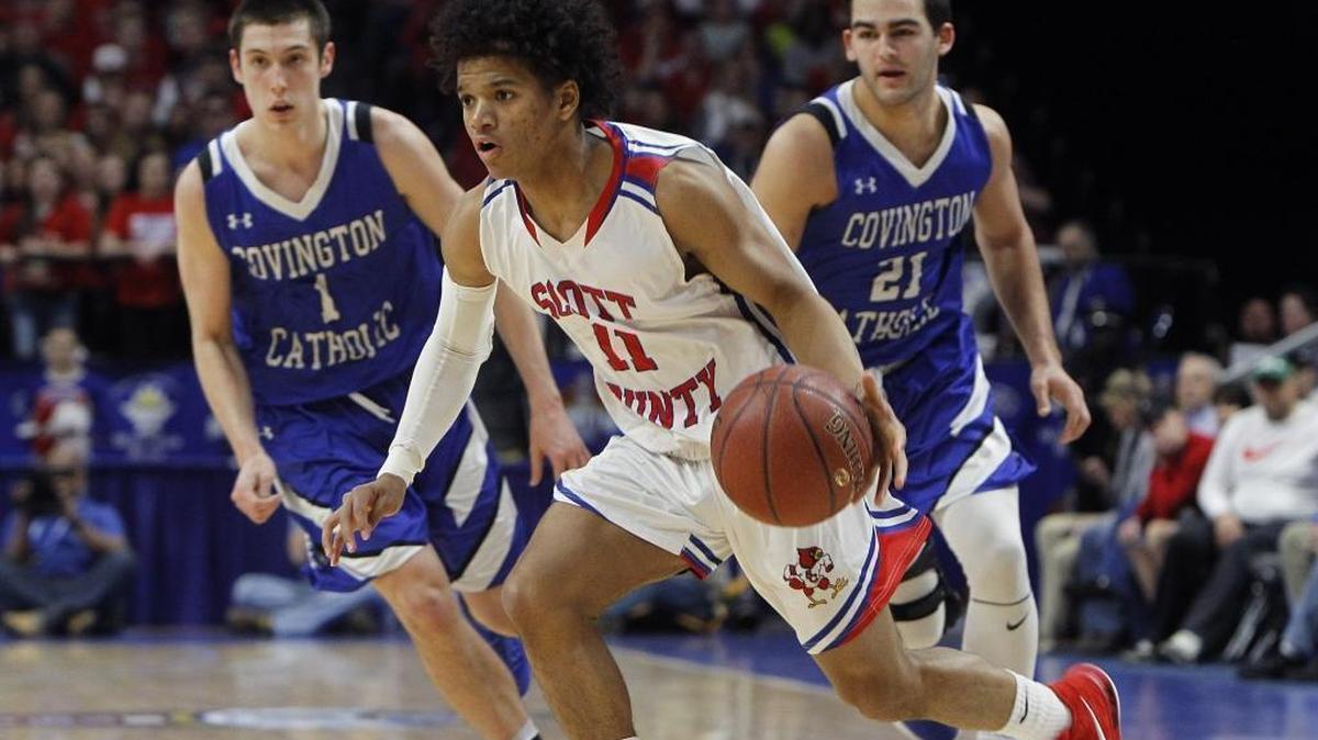 Scott County’s Diablo Stewart moved the ball Sunday against Covington Catholic in the championship game of the 2018 Whitaker Bank KHSAA Sweet 16 basketball tournament at Rupp Arena.