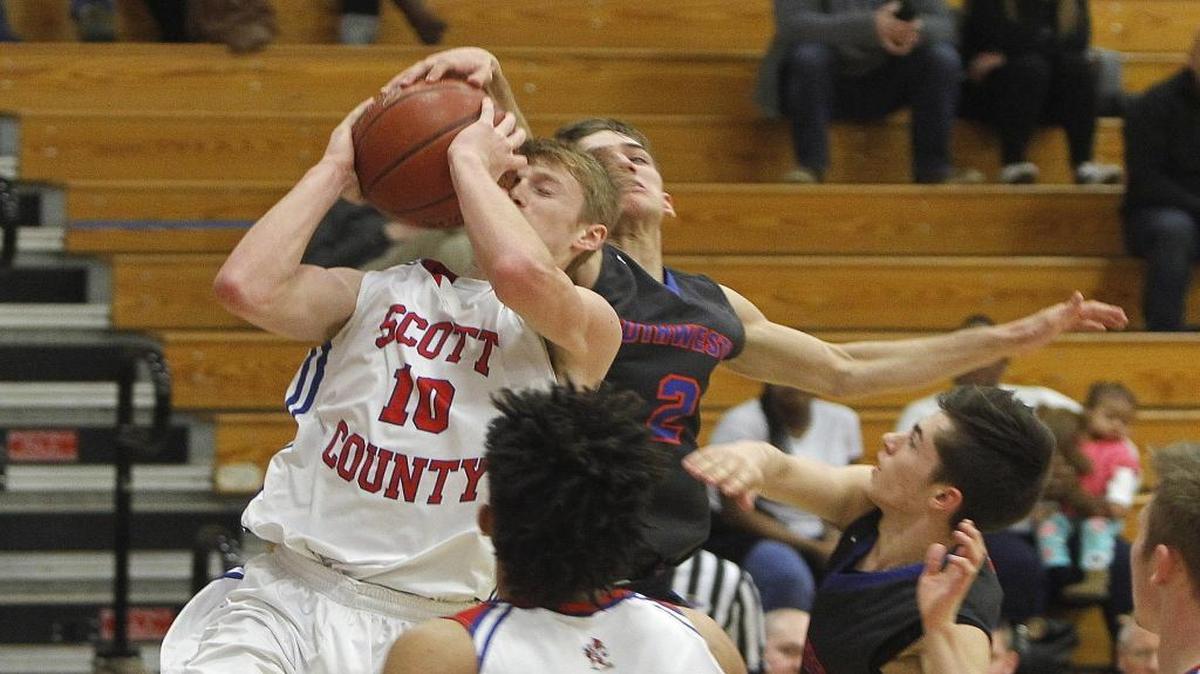 Scott County's Cooper Robb was fouled by Southwestern's Peyton Cundiff during the Jock Sutherland Classic at Lafayette on Feb. 4.