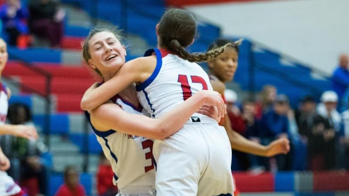 Mercer County’s Lexy Lake (12) and Emma Souder ran into each other chasing a rebound as host Mercer County defeated Butler 68-45.