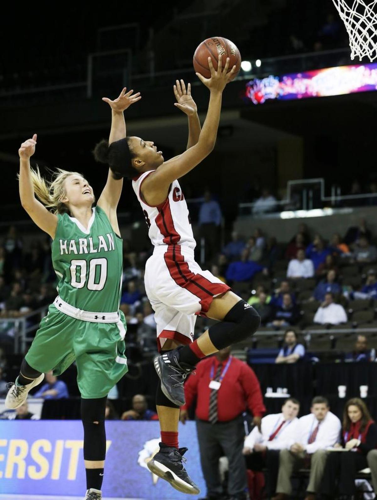 Harlan’s Jordan Brock (00) fouled Clark County’s Shemaya Behanan (23) during last year’s Sweet Sixteen at NKU.