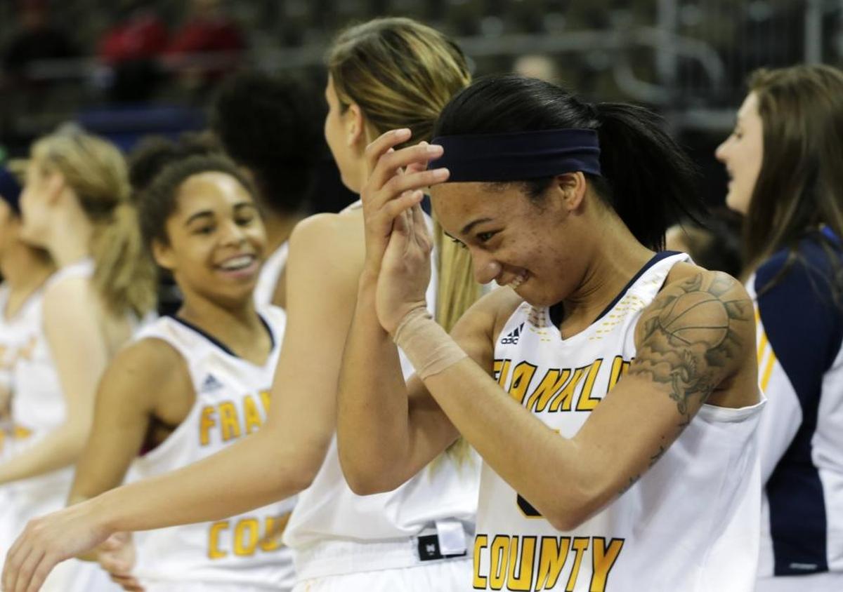 Franklin Co. lead scorer Princess Stewart (5) reacted as the clock ran down in the fourth quarter of the Franklin Co. vs Holmes girl's Sweet 16 semifinal basketball game at BB&T Arena in Highland Heights, Ky, on March 11, 2017. Franklin Co. beat Holmes 51-36.