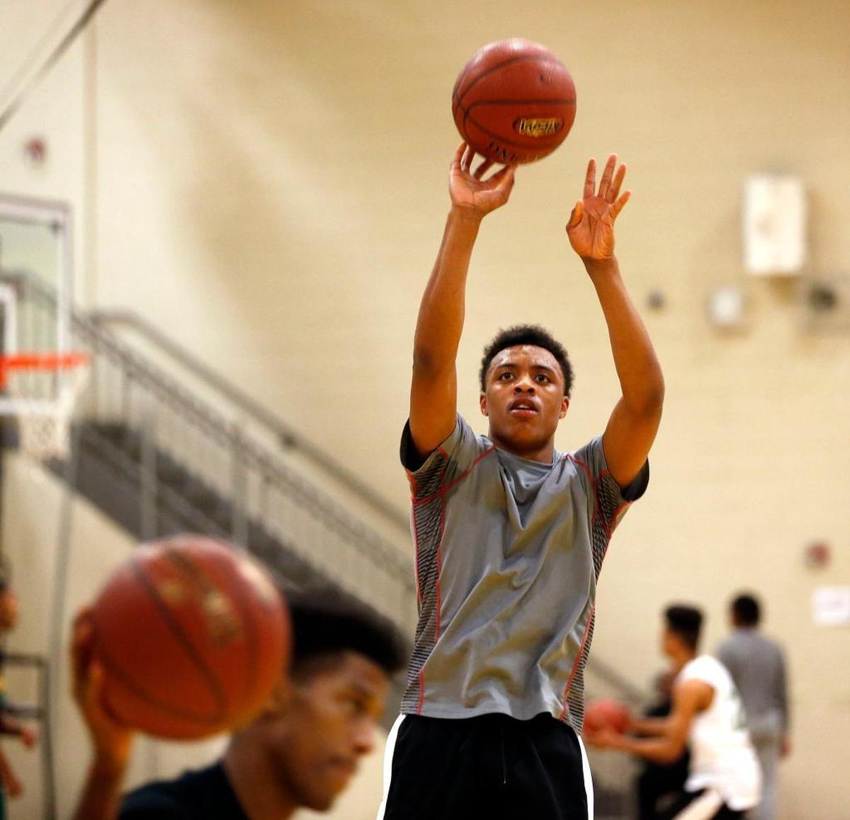 Eric Boone shot a jumper as the Bryan Station High School boys' basketball team practiced in the school gymnasium in Lexington, Ky., Wednesday, December 20, 2017. Bryan Station boys' basketball is off to the best start in years, defeating four city teams and two ranked teams so far.