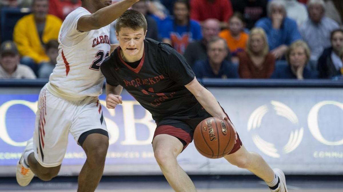 McCracken County’s Cameron Cartwright drove against Mayfield’s Kent Trey Matthews during the 1st Region Tournament at the CFSB Center in Murray last week. Cartwright was named tournament MVP.