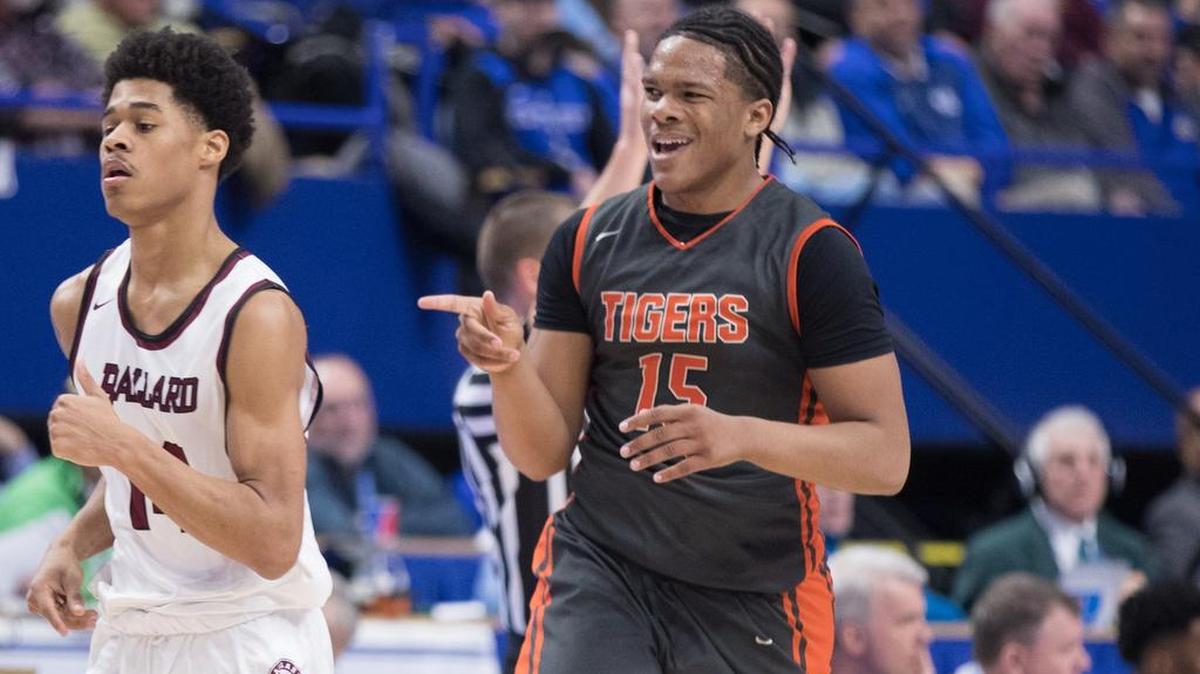 Fern Creek Clint Wickliffe (15) sank a three ball. Fern Creek and Ballard played in the quarter finals of the Whitaker Bank/KHSAA Boys' Sweet 16 at Rupp Arena on Friday March 17, 2017 in Lexington, Ky.