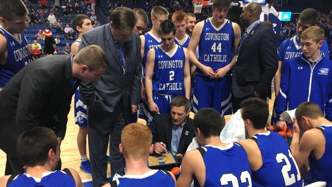Covington Catholic huddled during its game against Apollo in the first round of the 101st Whitaker Bank/KHSAA Boys’ Sweet Sixteen on March 15, 2018, at Rupp Arena.