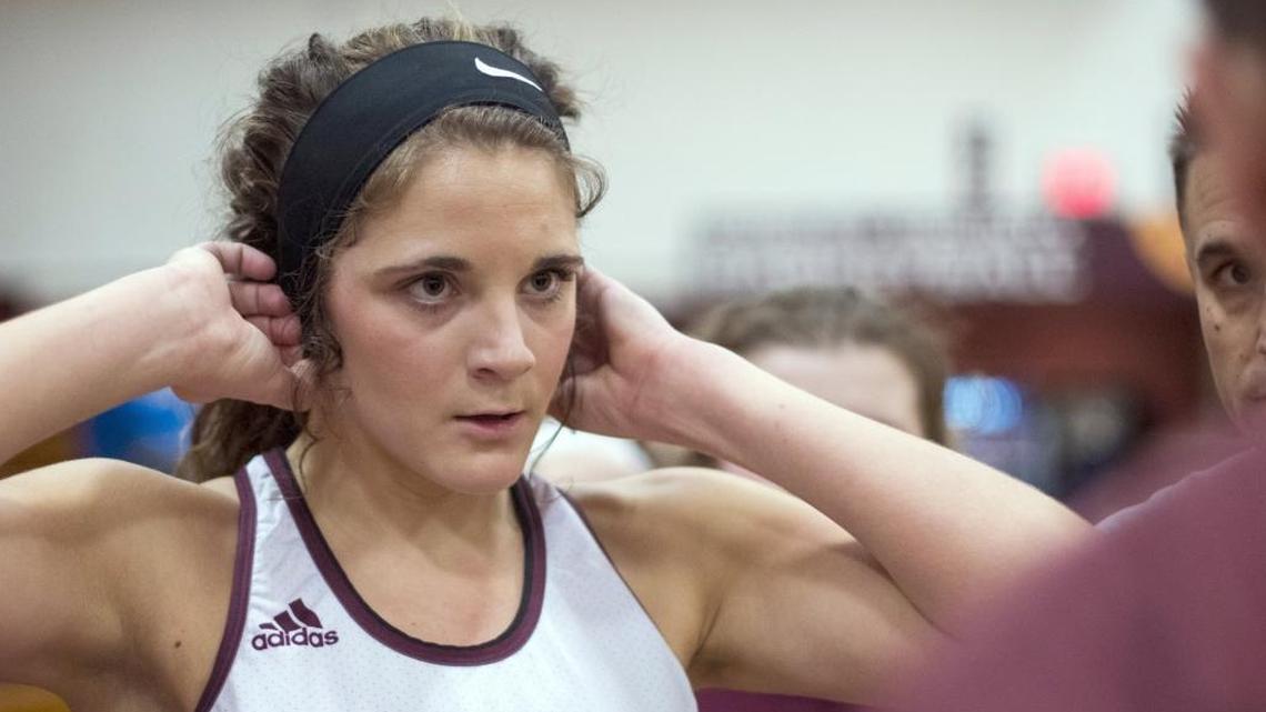 Owsley County’s Macie Gibson listens to her coach during a timeout Tuesday, January 30, 2018, in the Owls’ 65-59 overtime win against Estill County at the Owsley County High School in Booneville, Ky. Gibson scored 45 points and pulled down 20 rebounds.