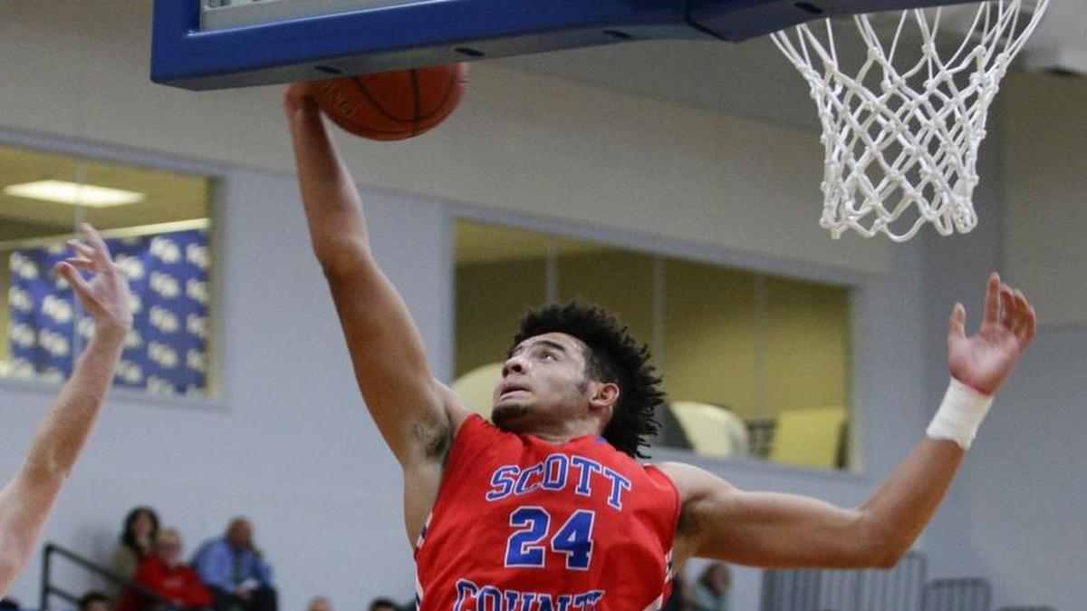 Scott County's Michael Moreno grabbed a rebound against Lexington Christian on Dec. 7, 2016.