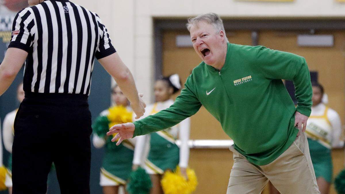 Bryan Station boys basketball coach Champ Ligon is among the coaches opposed to implementing a shot clock in Kentucky high school basketball.   