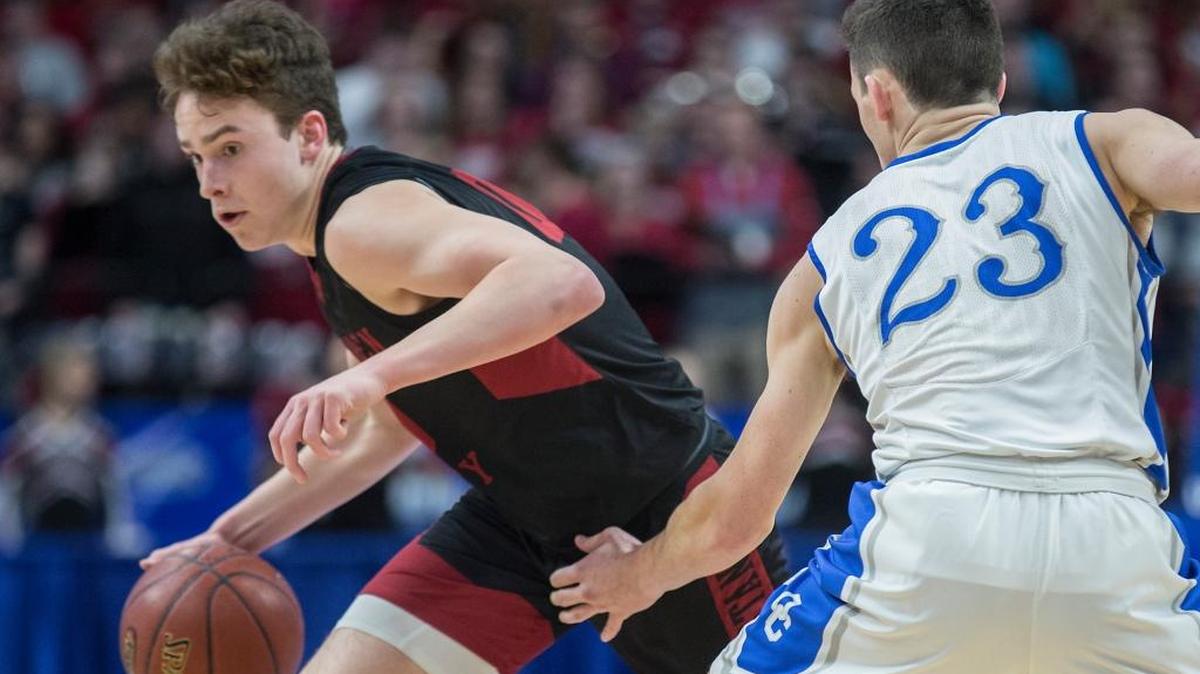 McCracken County’s Jackson Sivills drives past Oldham County’s Zach Larimore during a first round game Thursday in the Whitaker Bank/KHSAA Boys’ Sweet Sixteen game at Rupp Arena.