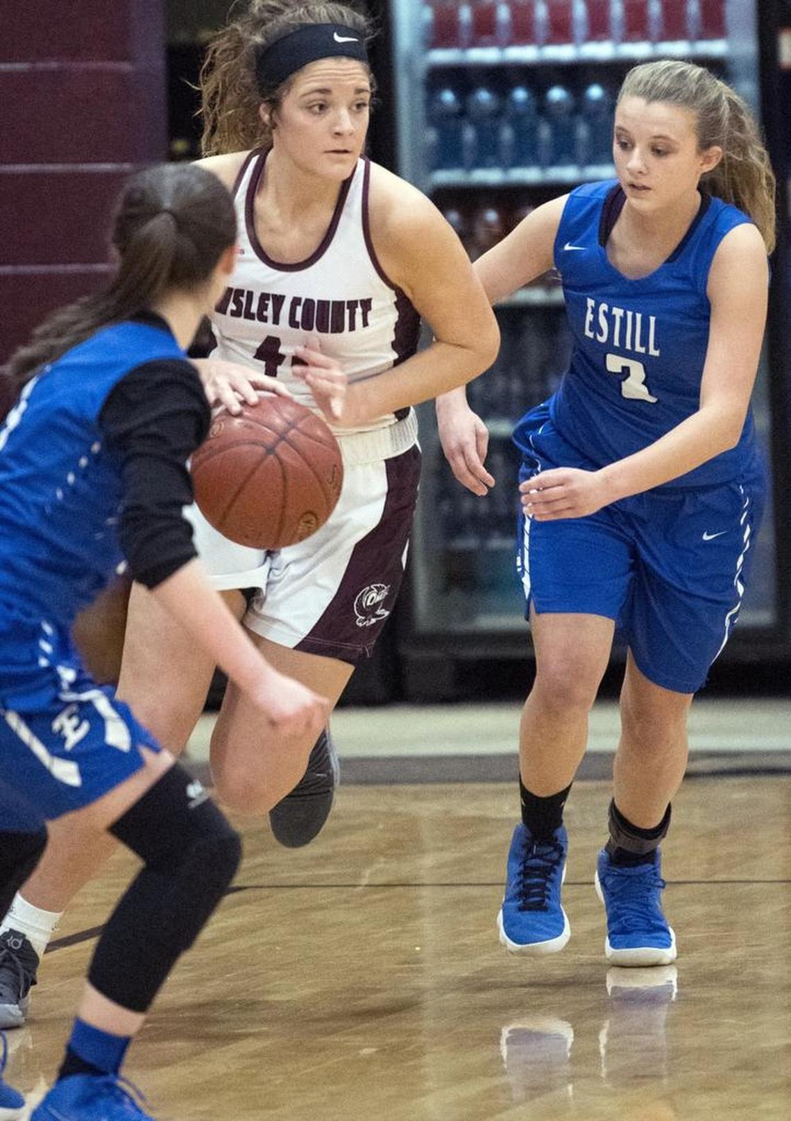 Owlsey County’s Macie Gibson moves the ball upcourt on a steal against Estill County Tuesday, January 30, 2018, at the Owsley County High School in Booneville, Ky.Gibson scored 45 points and pulled down 20 rebounds in the Owls’ 65-59 overtime win.