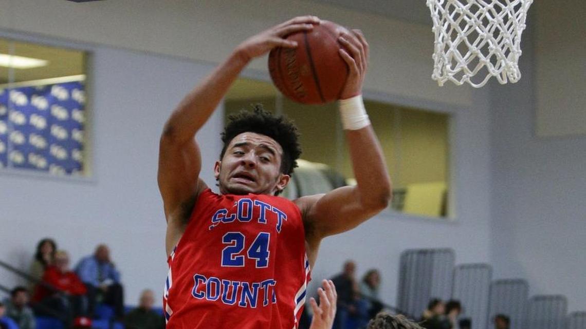Scott County's Michael Moreno, pulled down a rebound as LCA played Scott County on Dec. 7, 2016, in Lexington.