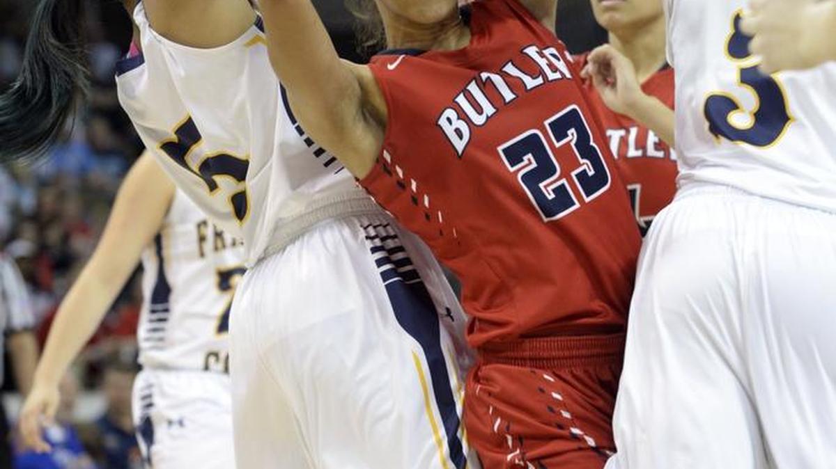 Butler’s Jaelynn Penn drives through the Franklin County defense for a shot, Sunday, March 13, 2016, during the KHSAA Girls' Sweet 16 basketball final in Highland Heights, Ky.