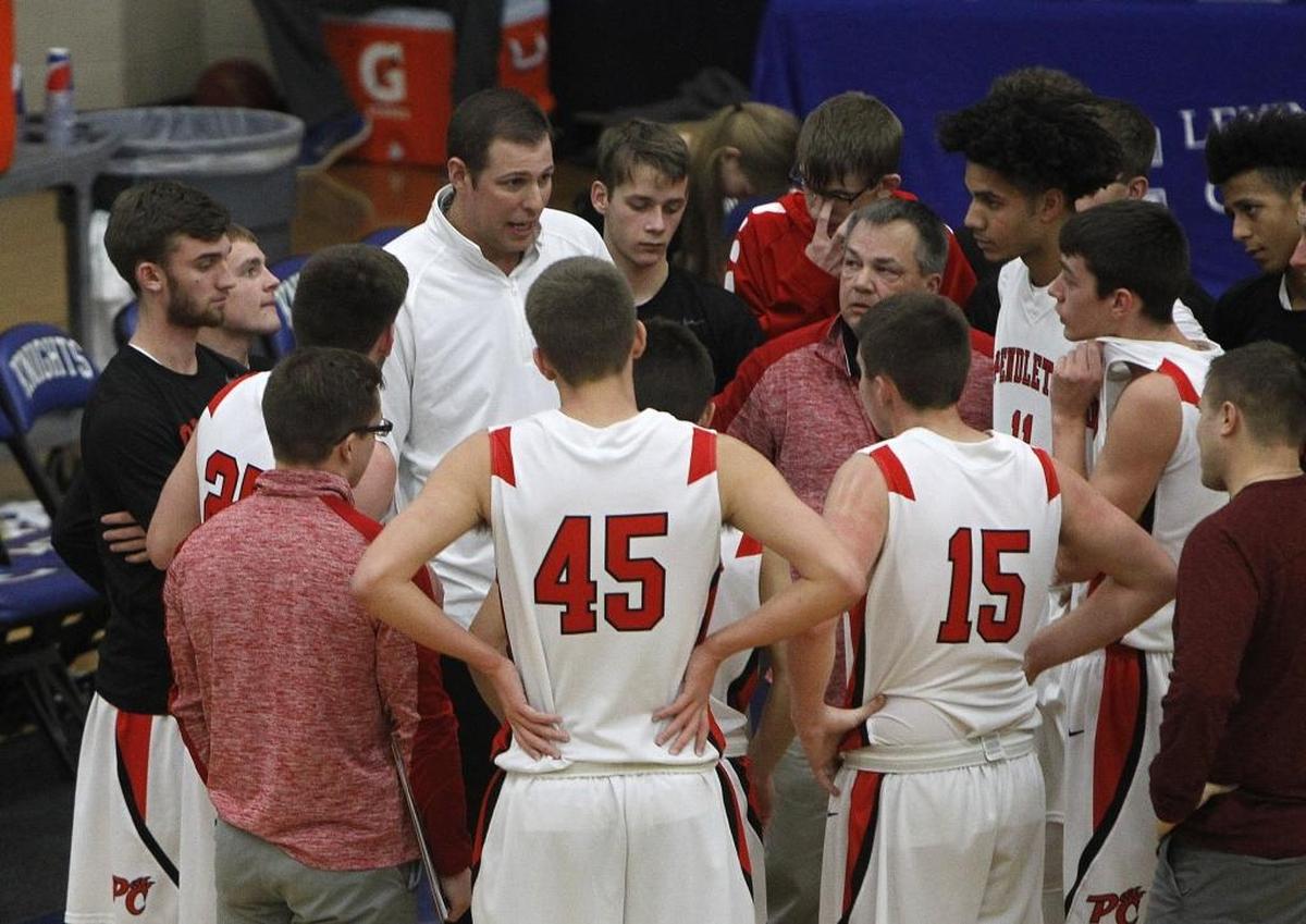 Pendleton County head coach Keaton Belcher talked to his team during a timeout while playing Daviess County during a holiday tournament at Lexington Catholic last week.