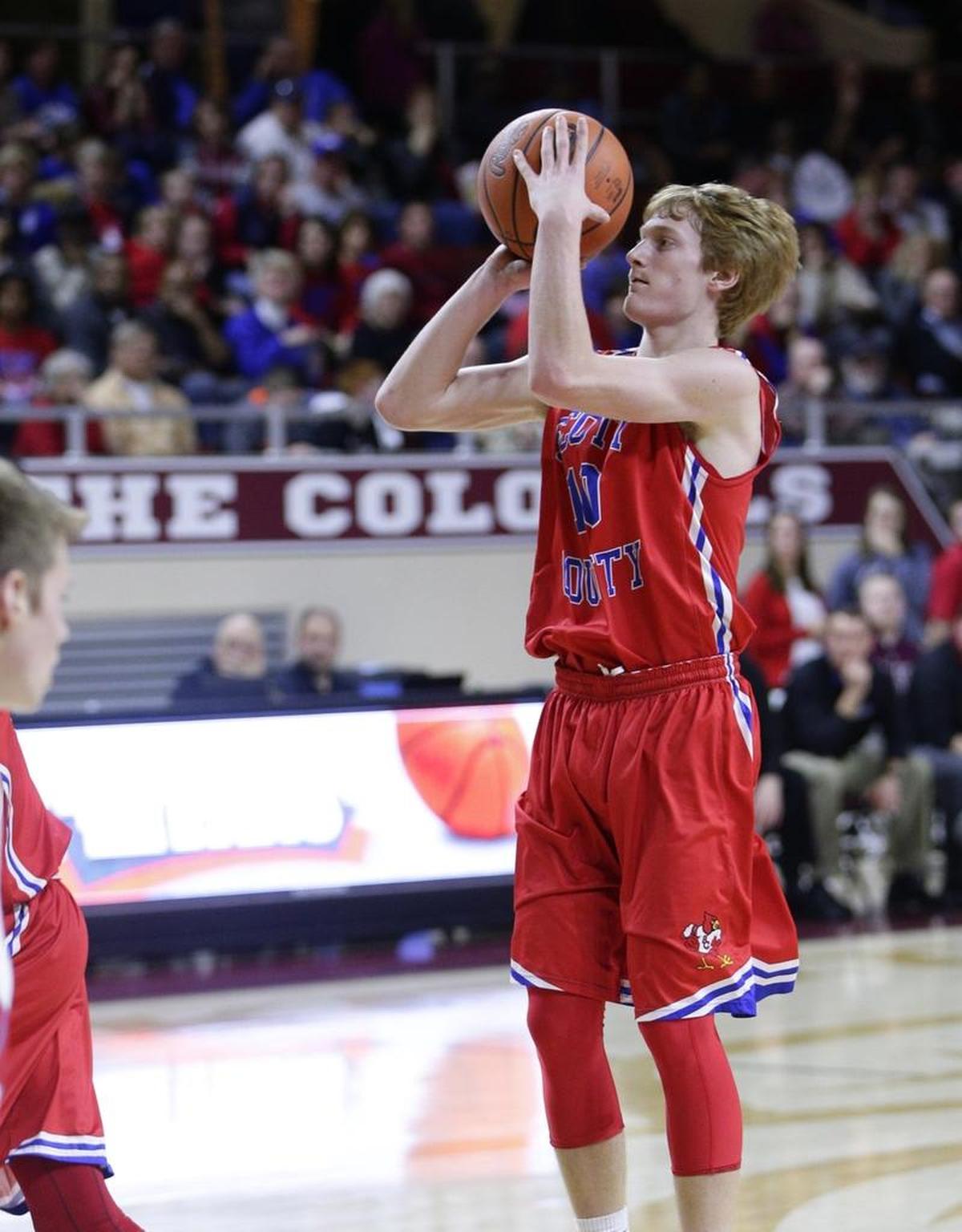 Scott County's Cooper Robb, put in two of his 17 points as Scott County defeated Madison Central 71-67 in the 11th region tournament on Wednesday March 2, 2016 in Richmond, Ky.
