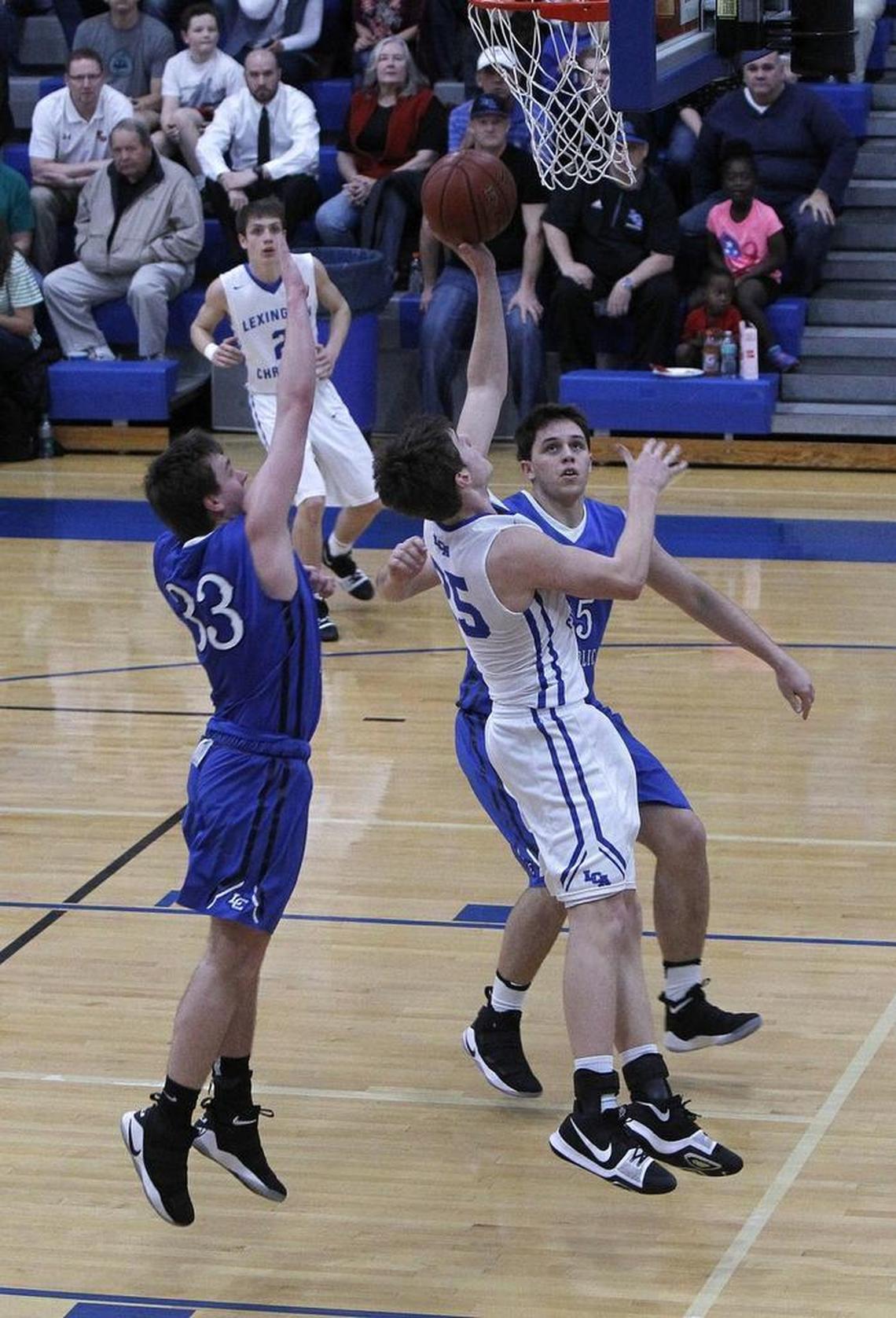 Lexington Christian's Austin Hall shot Tuesday evening against Lexington Catholic during the boys' 43rd district tournament at Lexington Christian. Lexington Christian prevailed 53-52 to earn a return trip to the 11th region tournament.