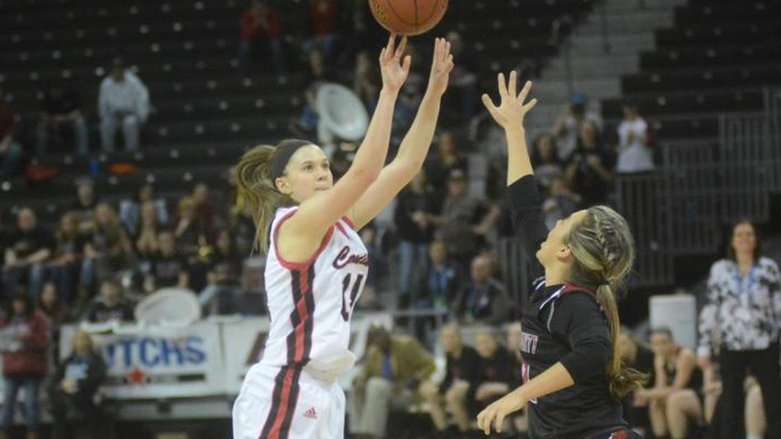 Kennedy Igo attempted a jump shot against Harlan County as the Clark County Cardinals defeated the Black Bears, 70-56, in the first round of the St. Elizabeth Healthcare/KHSAA Girls Sweet Sixteen basketball state tournament at BB&T Arena in Highland Heights.