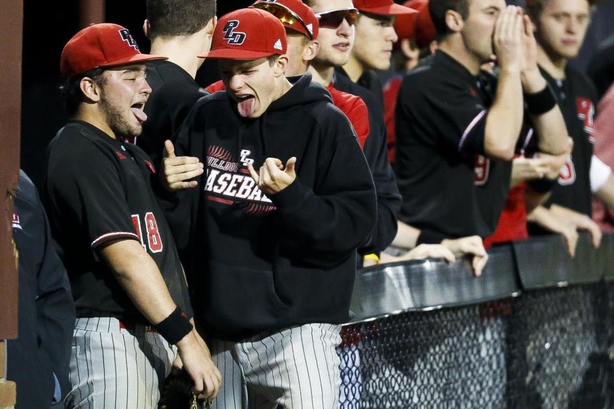 Paul Laurence Dunbar's Cam Baughman (18) and Paul Laurence Dunbar's Brendan Hord (26) celebrate during their game against Tates Creek at Tates Creek High School in Lexington, Ky., Wednesday, May 3, 2017.