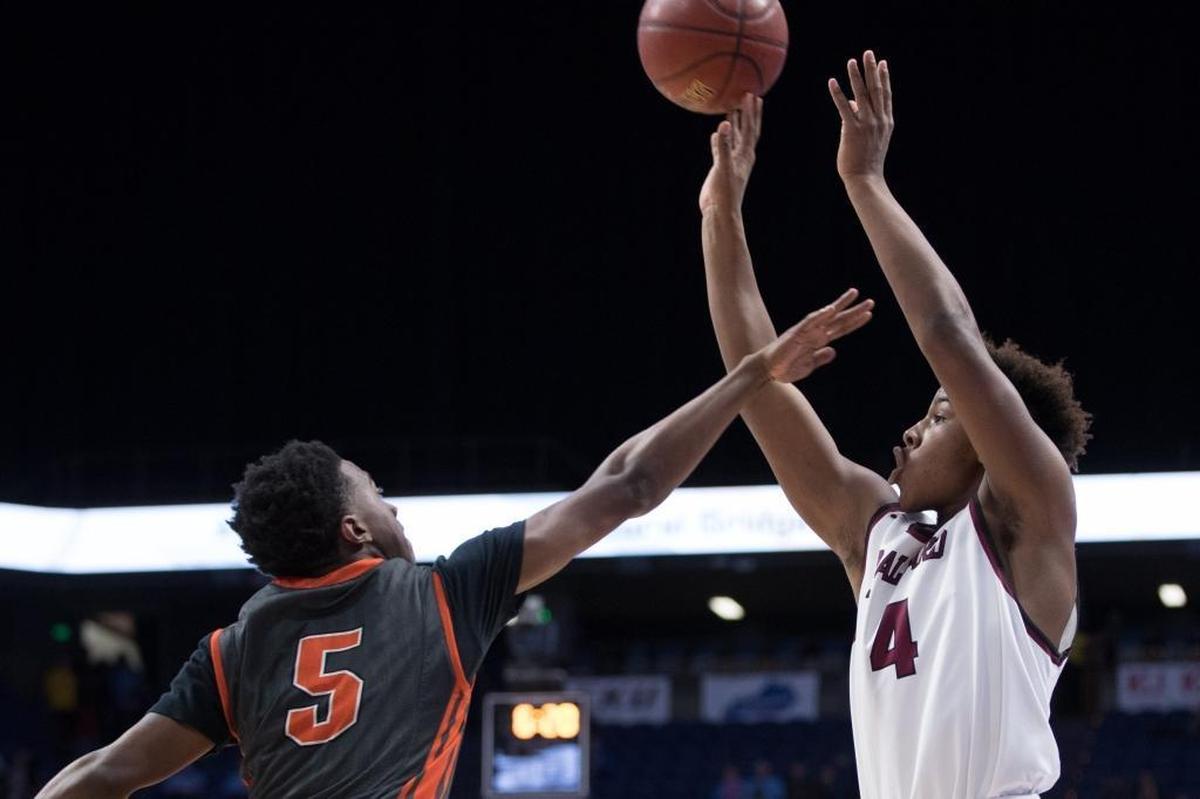 Once a Ballard High School basketball player, Marshon Ford (4) walked on at the University of Louisville in football. Ford has been a major pleasant surprise at H-back in Scott Satterfield’s first season as U of L head man.
