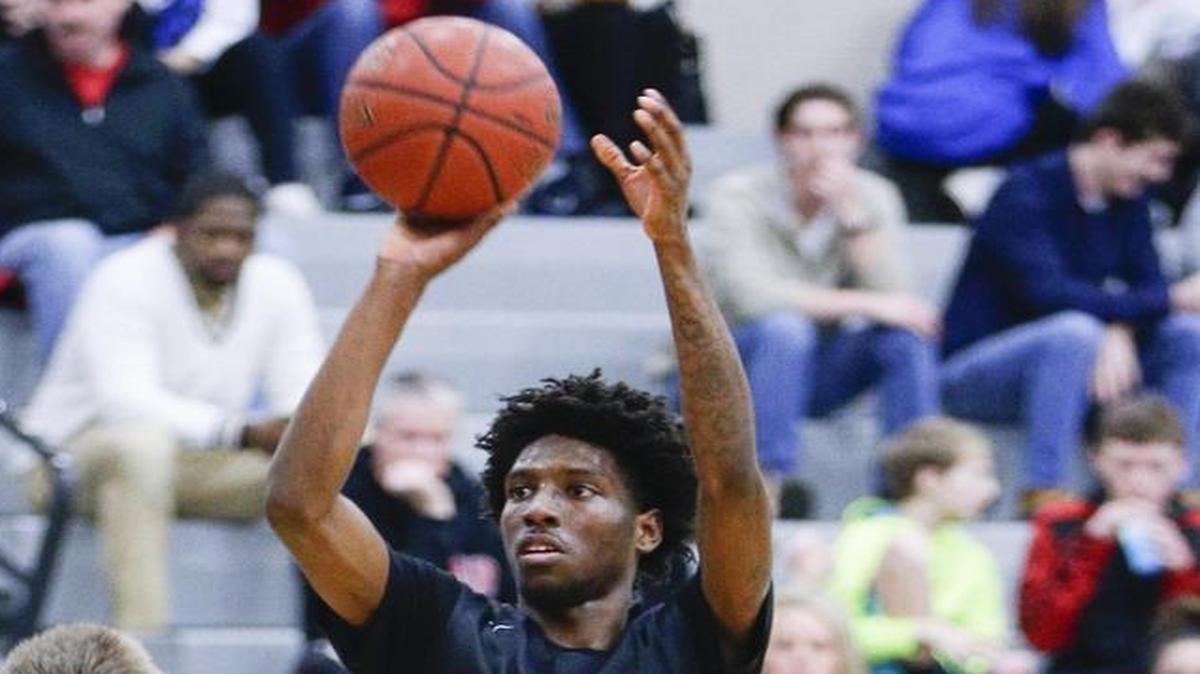 Dunbar's Taveion Hollingsworth put in two of his 10 points as Lexington Catholic defeated Dunbar 53-52 on Thursday January 18, 2017 in Lexington, Ky.