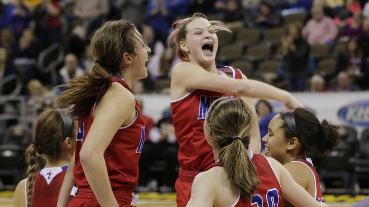 Mercer County’s Emma Davis (0) and her team celebrated their victory in the Girls’ Sweet Sixteen semifinals last March. The Titans went on to win the state championship and return most of their players for a run at a repeat in 2017-18.