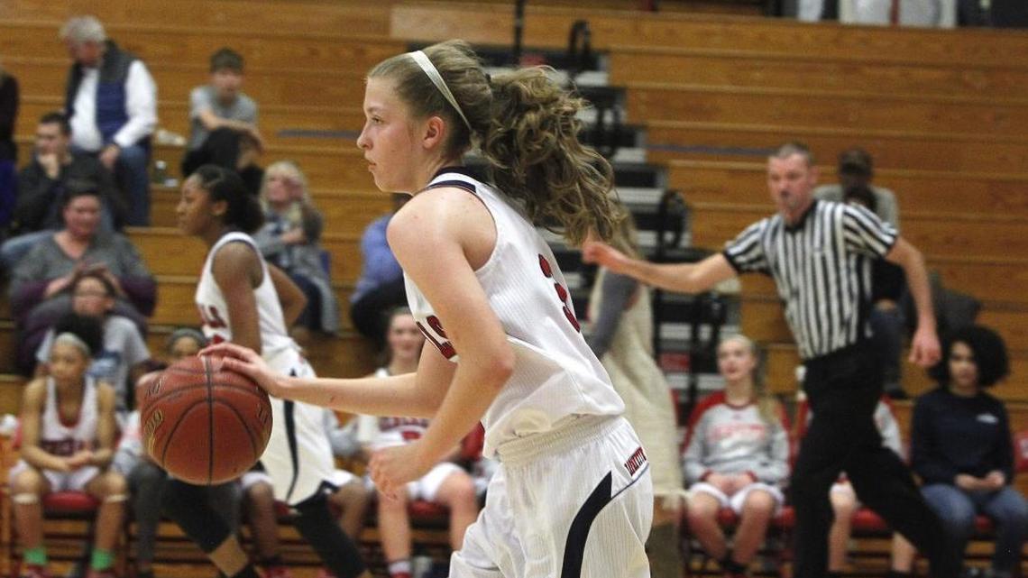 Lafayette's Lindi DeBilzan dribbles against Paul Laurence Dunbar at Lafayette's gymnasium in Lexington, Ky., Monday, January 16, 2017.