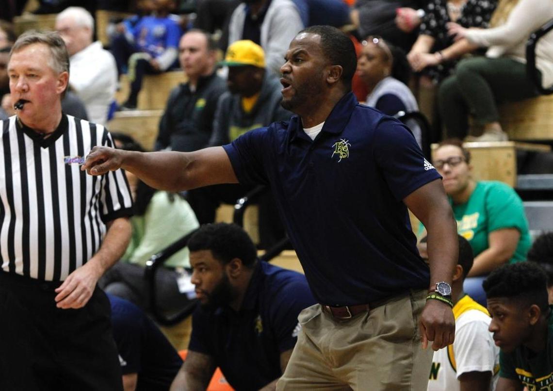 Bryan Station head coach Tommy Johnson Jr. instructed his team Wednesday in the game against Henry Clay during the boys’ 42nd district tournament at Frederick Douglass.