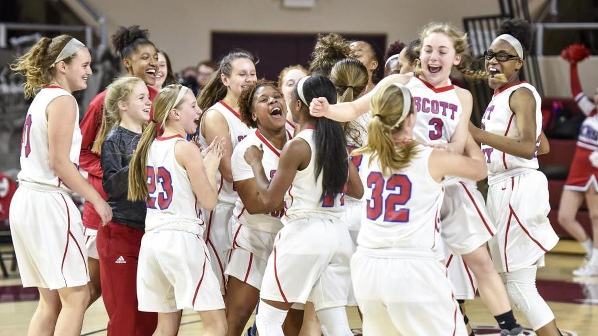 Scott County celebrates after beating Franklin County 77-54, in the finals of the girls 11th Region tournament, Saturday, March 3, 2018, at EKU's McBrayer Arena in Richmond.