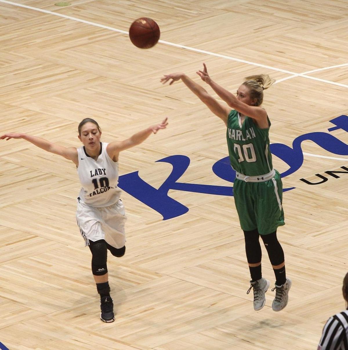 Harlan’s Jordan Brock shot a three-pointer against Monroe County in the finals of the All “A” Classic at Frankfort Convention Center in Frankfort on Jan. 29.